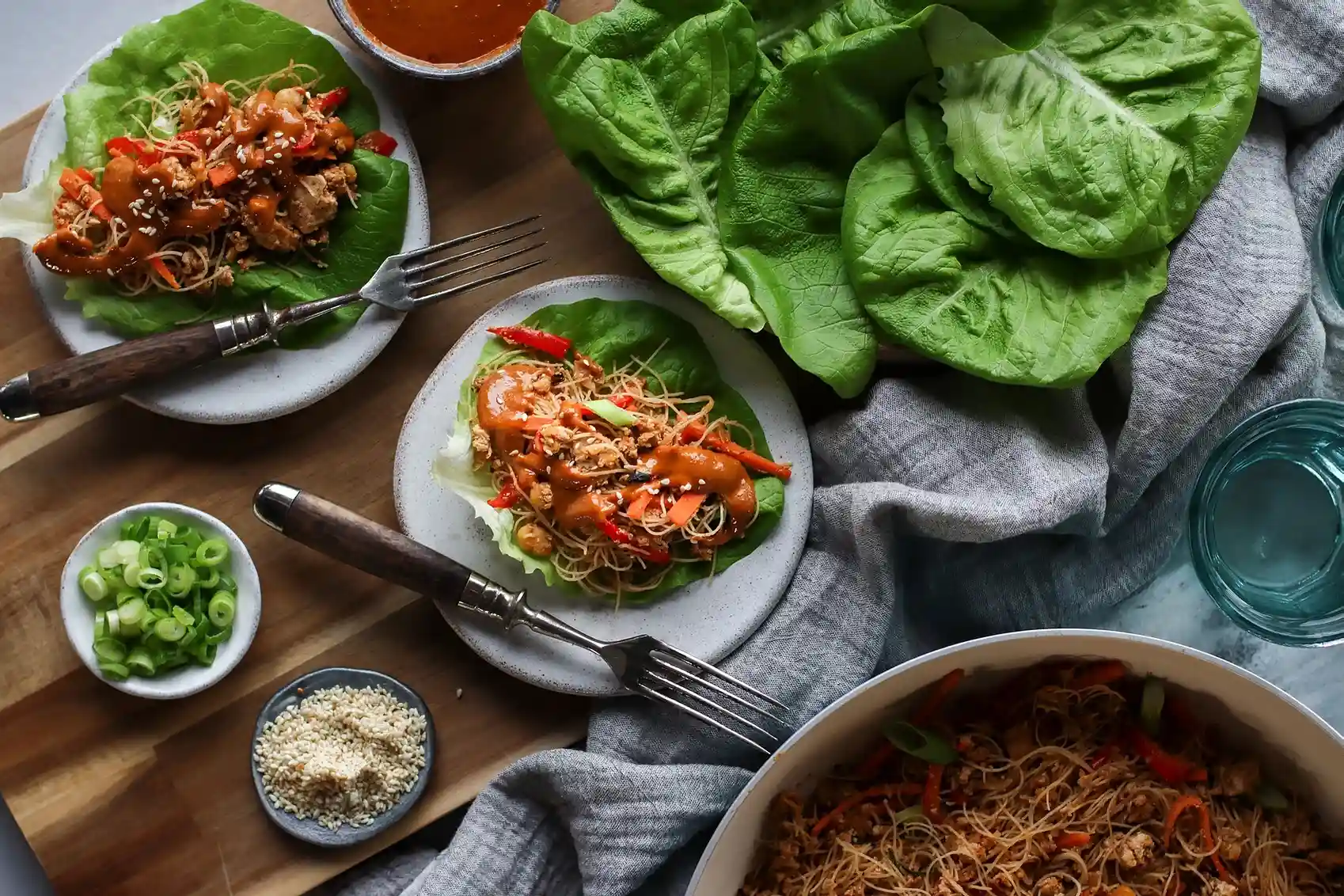 lettuce tofu wraps which include tofu, chickpea, sesame seeds, and peanut sauce for vegan protein